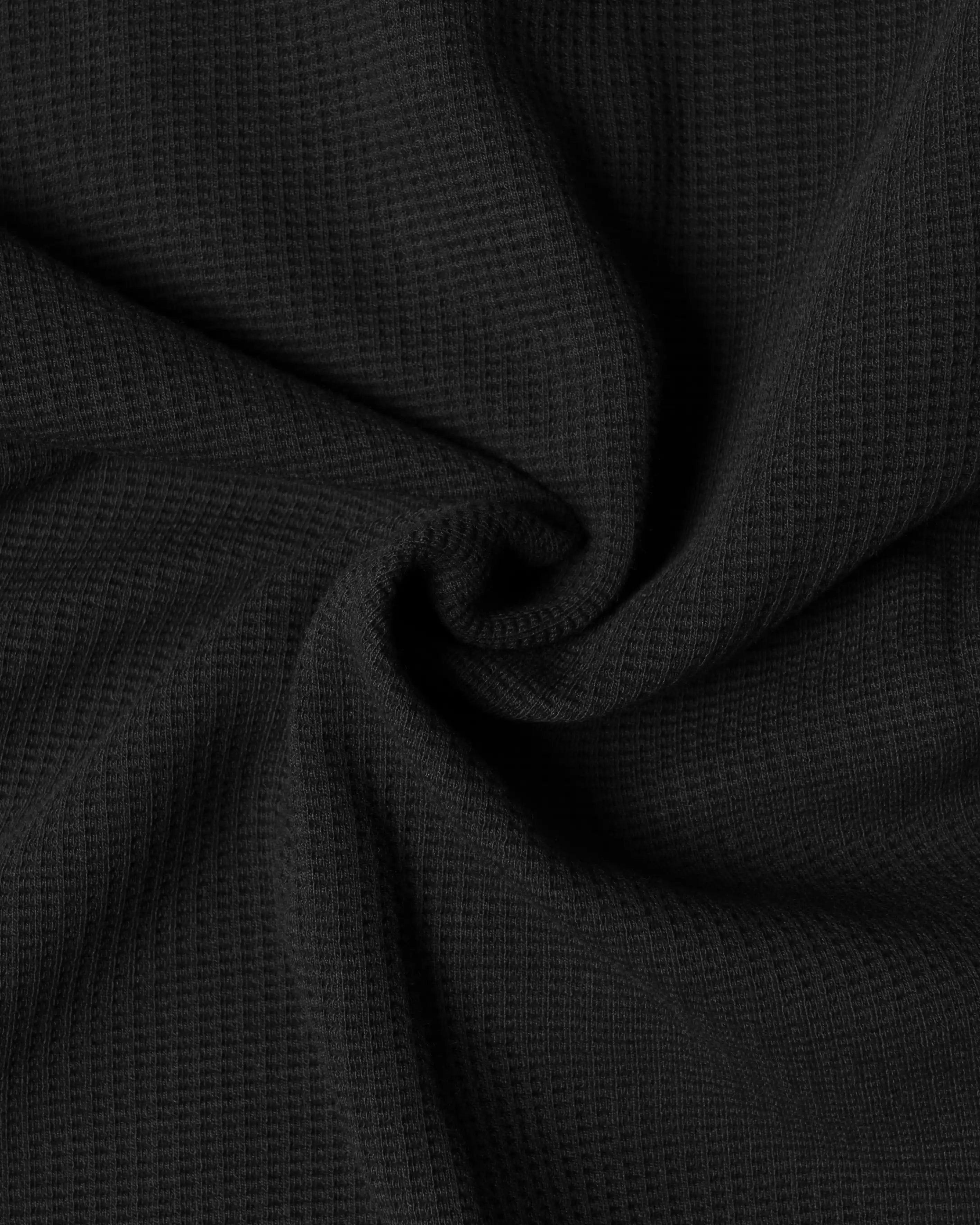 Ementa Polo Shirt
Waffle knit texture for enhanced breathability and structure
Ikon logo patch on the chest
Button-up front with four tonal buttons
Ribbed collar and sleeves
100% cotton
Regular fit
Unisex
Made in Portugal