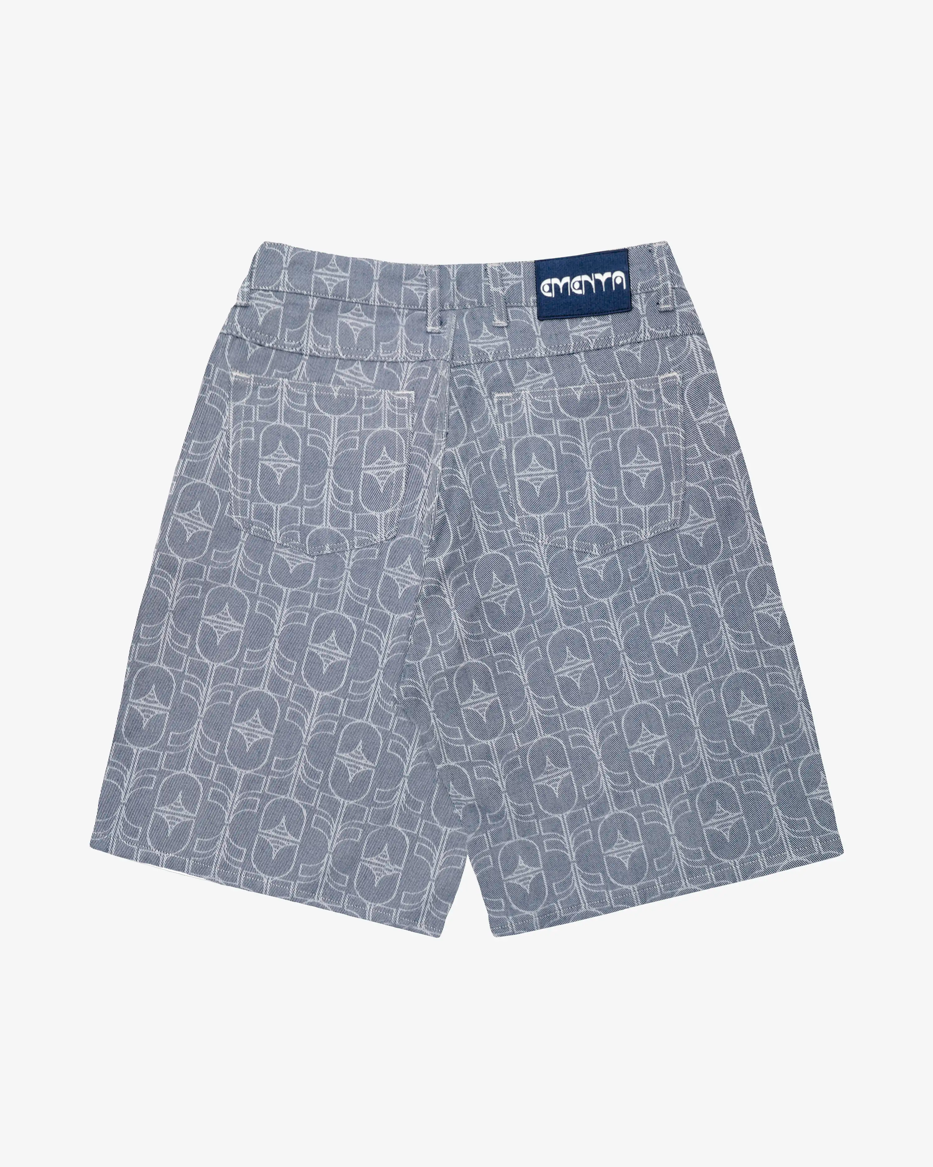 Available for shipping in October.
Denim shorts designed for everyday wear, featuring an all-over woven Flourish pattern.
Midweight cotton jacquard with a structured feel and textured finish.
Bonga is our baggy fit, offering a loose silhouette with extra room through the hip and leg for unrestricted movement.
Classic five-pocket construction with metal rivets, button closure and a woven Ementa back patch.
Blue denim jacquard fabric with a tonal all-over Flourish motif.
Made in Portugal.