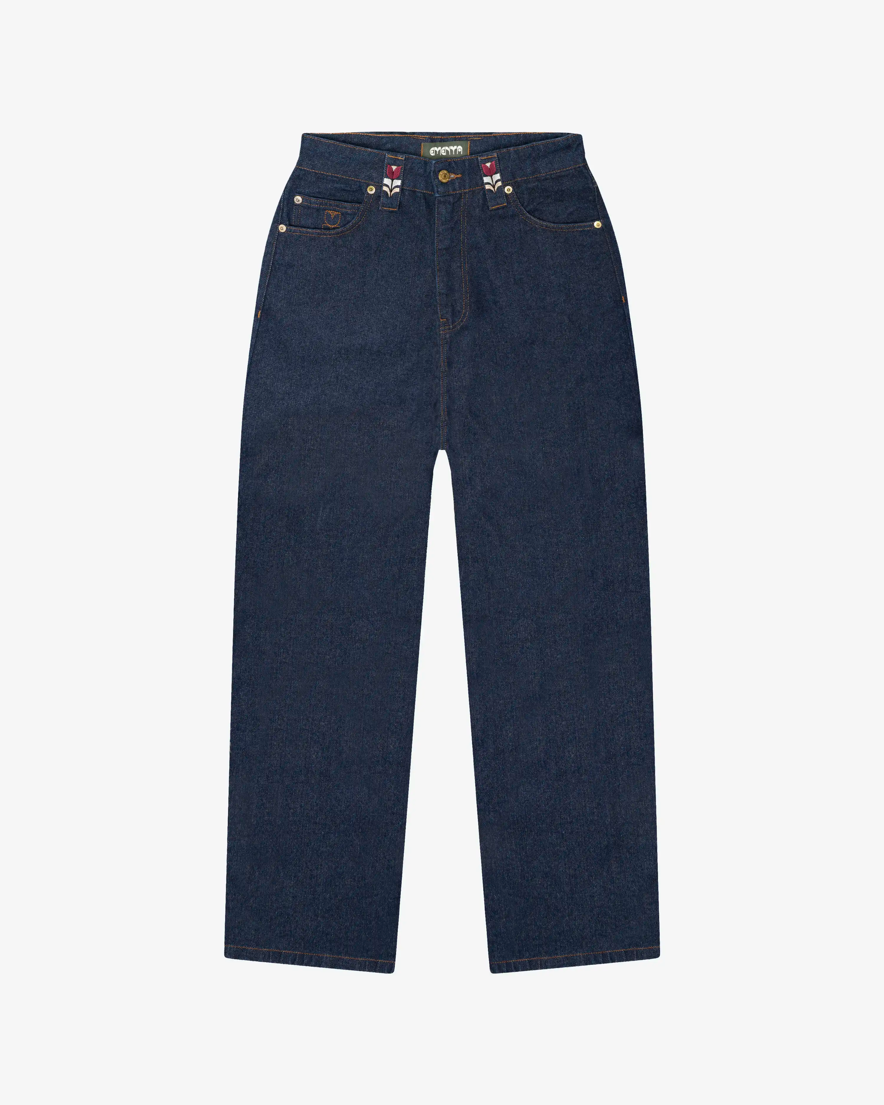 Straight-leg denim jeans designed for everyday wear as part of the Artist Edition Series, featuring artwork from the Flourish collection.
Raw blue denim construction with a structured feel that softens over time with wear.
Straight fit with a relaxed leg and classic five-pocket construction.
Features embroidered Flourish motifs on the belt loops, a matching embroidered coin pocket detail, and branded metal hardware with a zip fly.
Blue raw denim finish with contrast tobacco stitching and embroidered brandin
