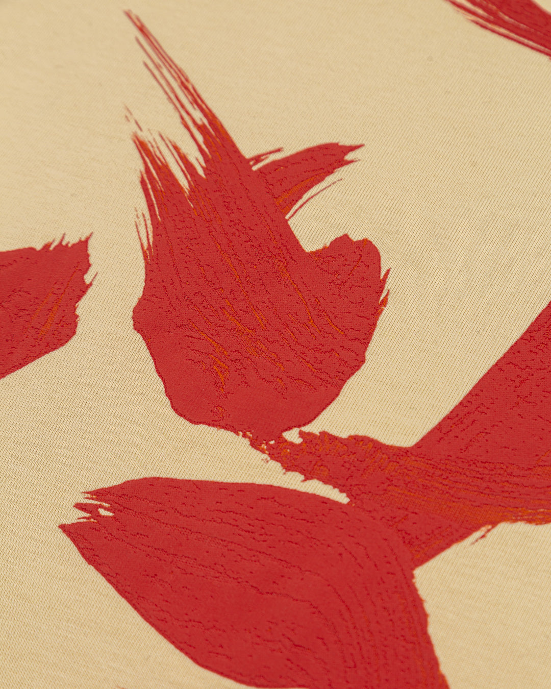 Artist Edition.
The Bitty T-Shirt, in off-white, features a red Ementa dots logo on the front, contrasted by a hand-drawn design on the back, originally created on canvas by an artist. This piece blends simplicity with a unique artistic touch.
Crafted from thick cotton, it has a regular, unisex fit, it is comfortable and versatile, perfect for everyday wear.