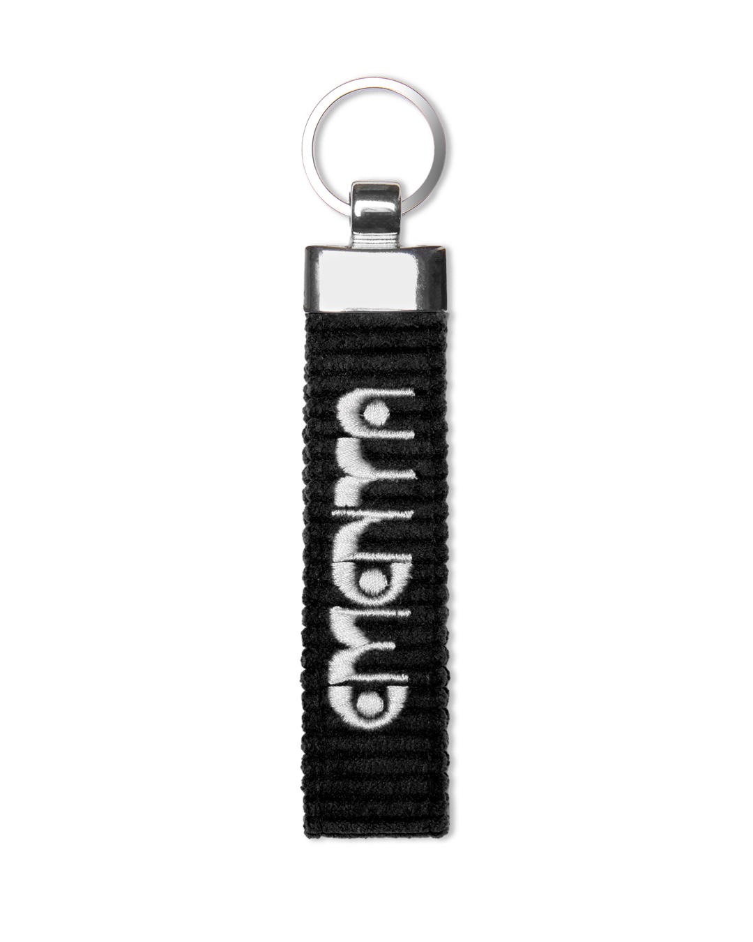 A corduroy keychain with the Ementa Dots logo in a metal finish.
Comes with a sturdy key ring. 
Simple, durable, and easy to carry.
The corduroy band measures 10,5cm in width and 2,5cm in length.
