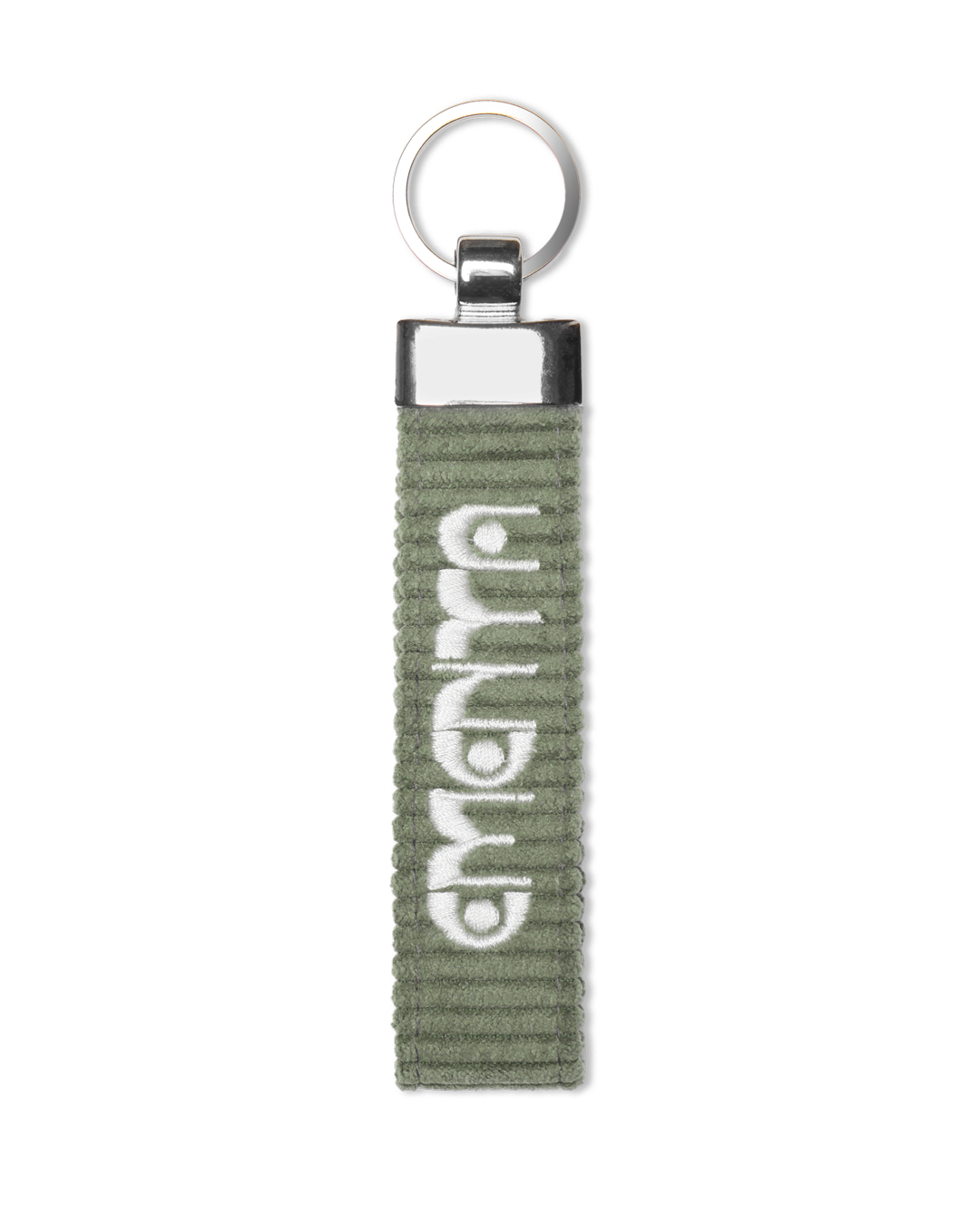 A corduroy keychain with the Ementa Dots logo in a metal finish.
Comes with a sturdy key ring. 
Simple, durable, and easy to carry.
The corduroy band measures 10,5cm in width and 2,5cm in length.