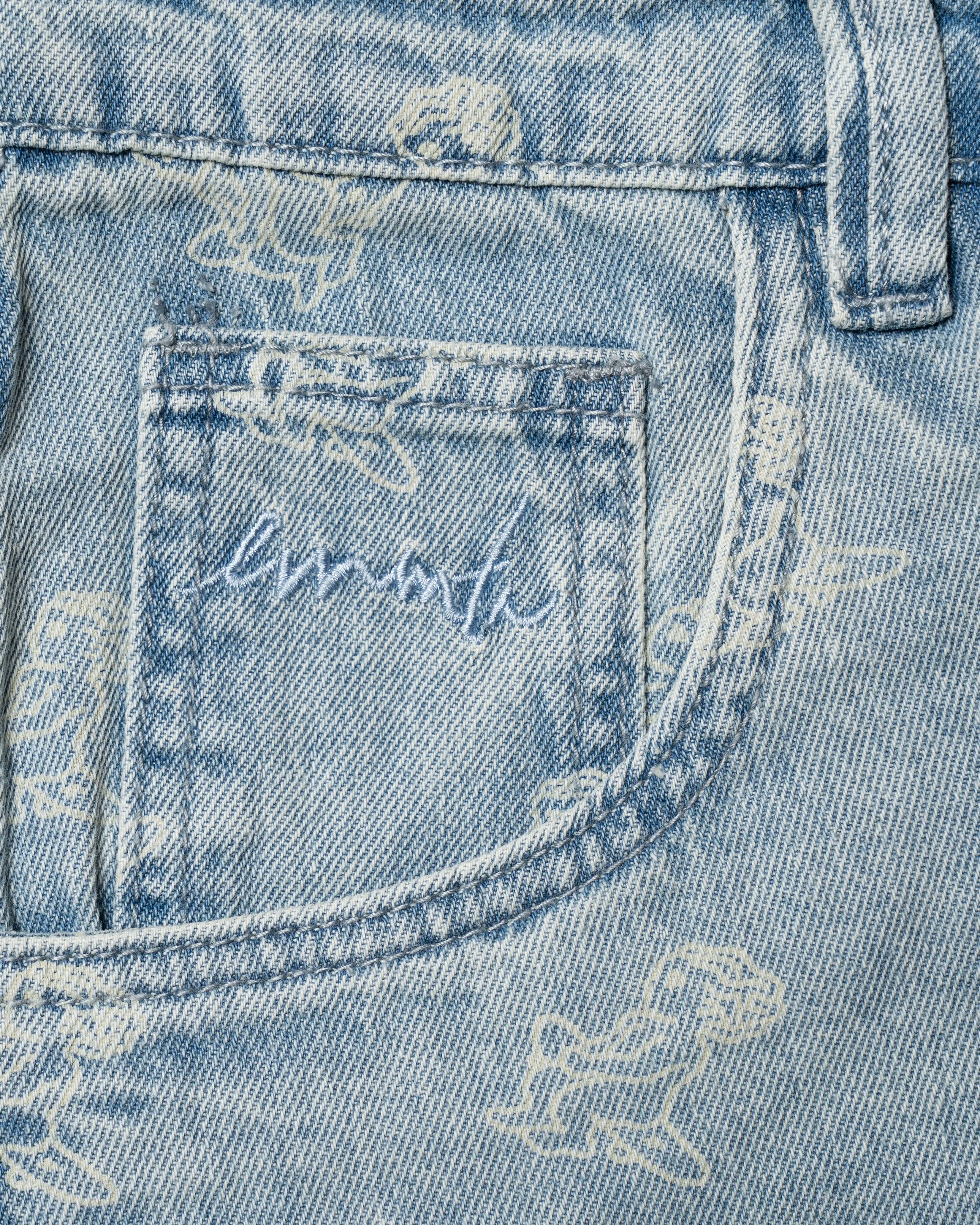 Light blue denim with all-over Ikon logo
Pair with the matching Emodi Kit Shirt for a complete look
100% cotton for comfort and breathability
Relaxed fit with mid-length leg
Classic 5-pocket construction for everyday function
Zip fly with button closure and belt loops
Unisex design
Cold wash only