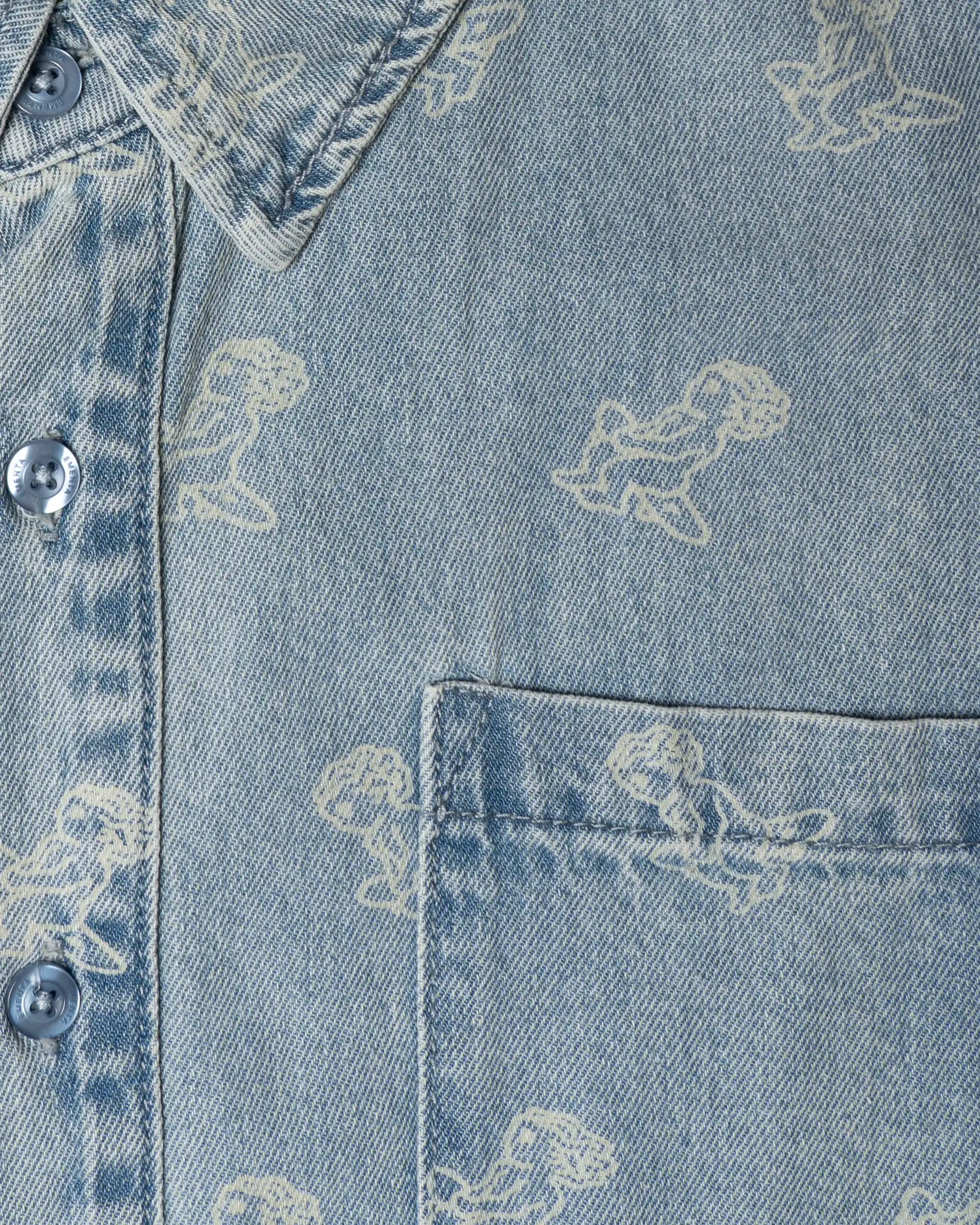 Light blue denim with all-over Ikon logo
Made from 100% cotton for a soft, breathable feel
Short-sleeved construction with a single chest pocket
Button front closure with tonal stitching
Slightly dropped shoulders for a relaxed silhouette
Unisex design
Cold wash only