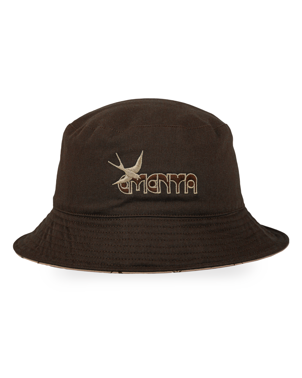 The Lisa Reversible Bucket Hat is inspired by Lisbon’s rich culture, featuring traditional tiles and swallows. One side is crafted in a warm brown tone with an embroidered Ementa Dots logo and a swallow detail, while the reverse side is off-white, adorned with a brown pattern of Lisbon’s iconic tiles and swallows. Made from durable 100% cotton twill, this hat offers breathability and comfort, making it a versatile piece for everyday wear.