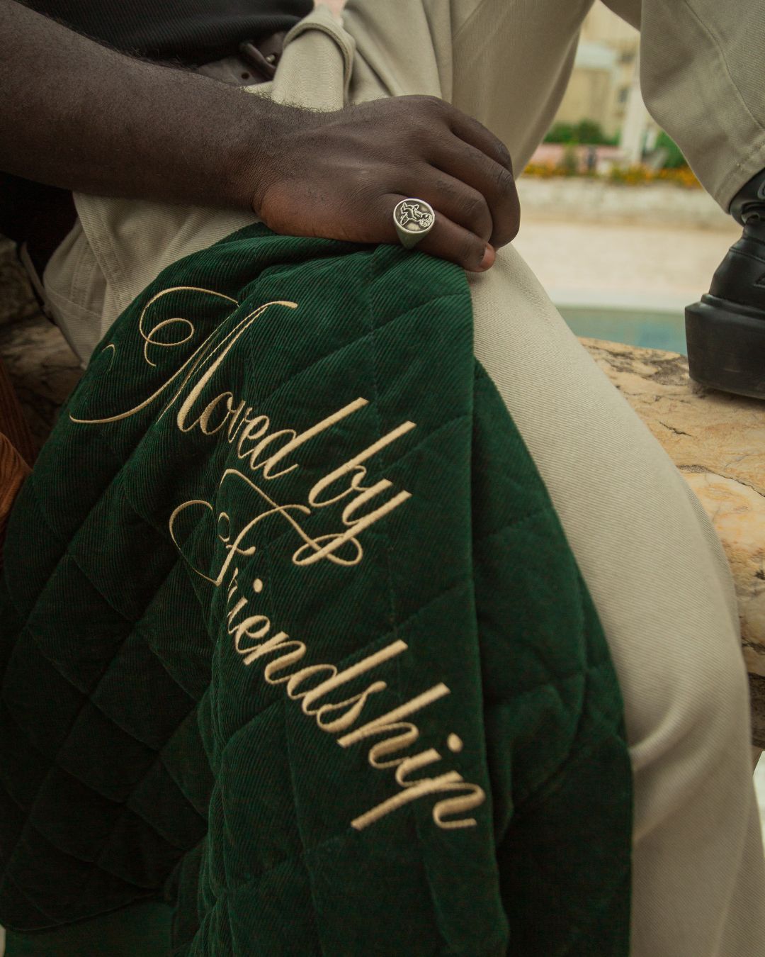 Classic style corduroy puffer jacket in green featuring diamond stitching for added texture. The exterior is crafted from soft corduroy, providing both comfort and durability, while the interior is made from smooth polyester for a cozy fit.