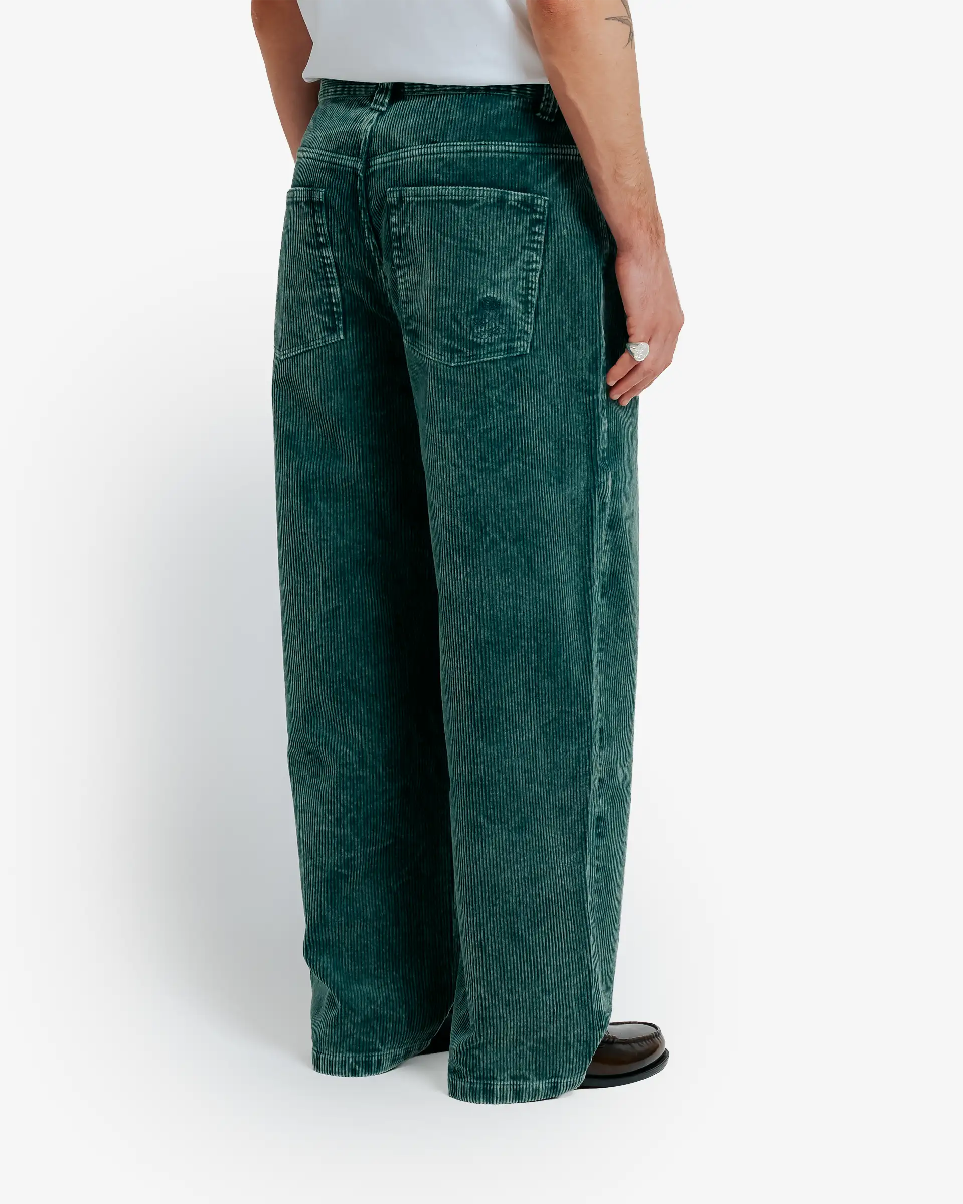 Bonga is our baggy fit. It is very loose from waist to ankle, designed for comfort and a bold, laid-back look.
Bold oversized look designed for maximum freedom of movement
100% cotton construction for lasting durability and comfort
Unisex fit engineered to suit all genders
Corduroy material with green washed colorway and an authentic wash treatment
Relaxed profile perfect for contemporary streetwear styling
Roomy cut allows for unrestricted movement throughout the day
Heavyweight fabric provides structure