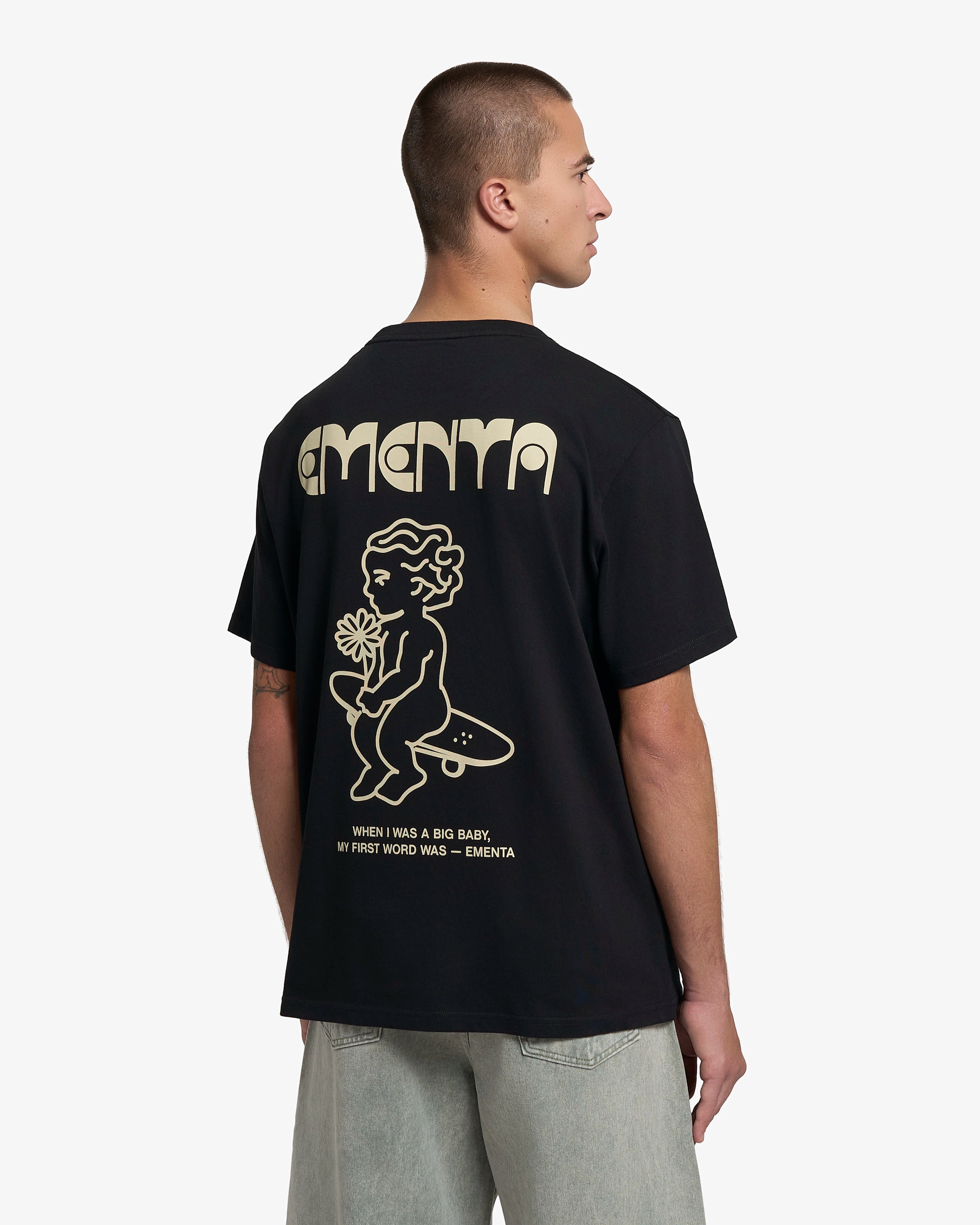 100% cotton, 240 g/m²
Soft feel with a structured shape
Black color with off-white "First Word" print
Pre-shrunk to hold its shape after washing
Reinforced collar and double-stitched hems for durability
Unisex fit
Made in Portugal