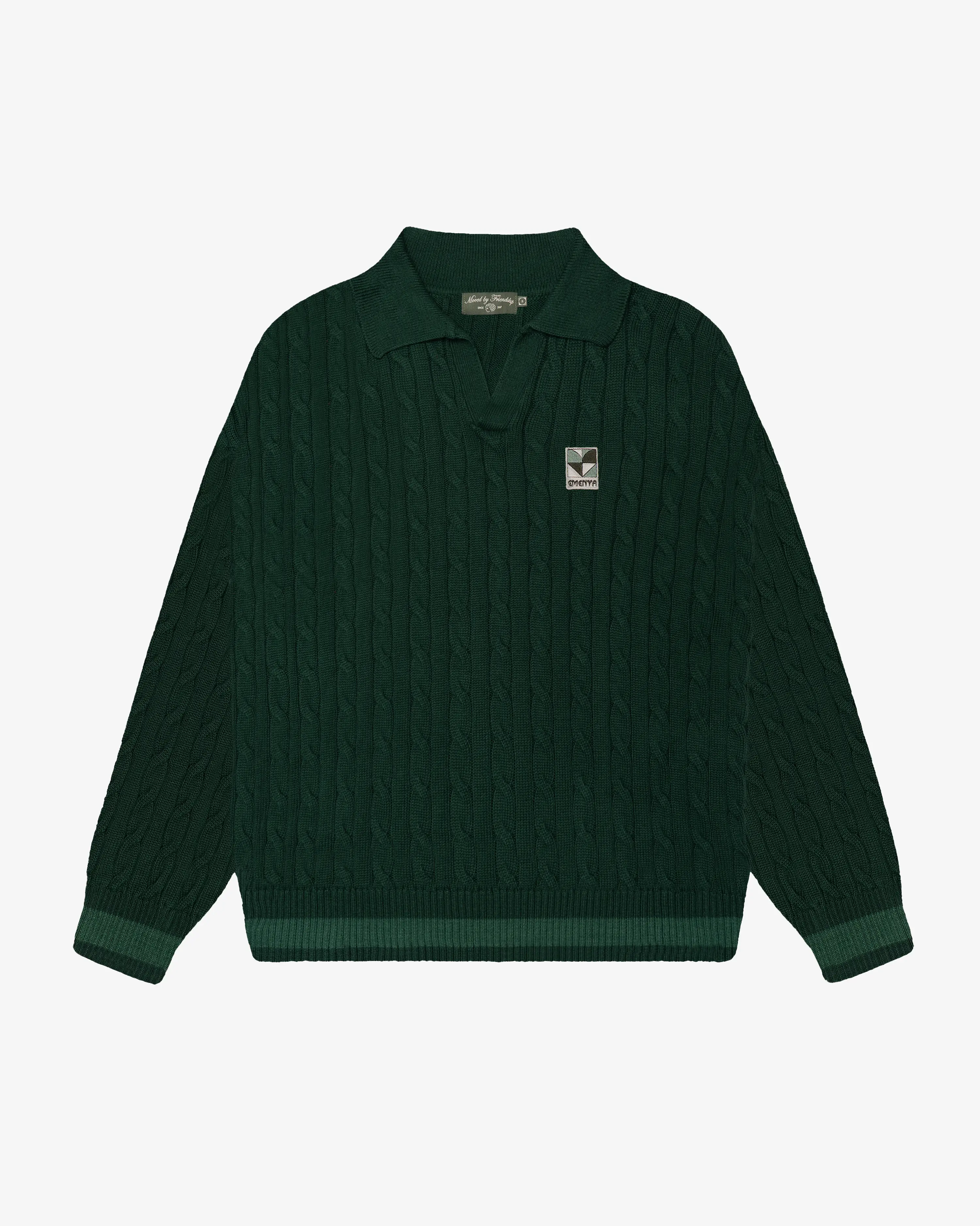 Evergreen cotton cable knit polo with a relaxed silhouette, ribbed cuffs and hem and a Heart logo patch on the chest. Midweight knit construction. Made in Portugal.