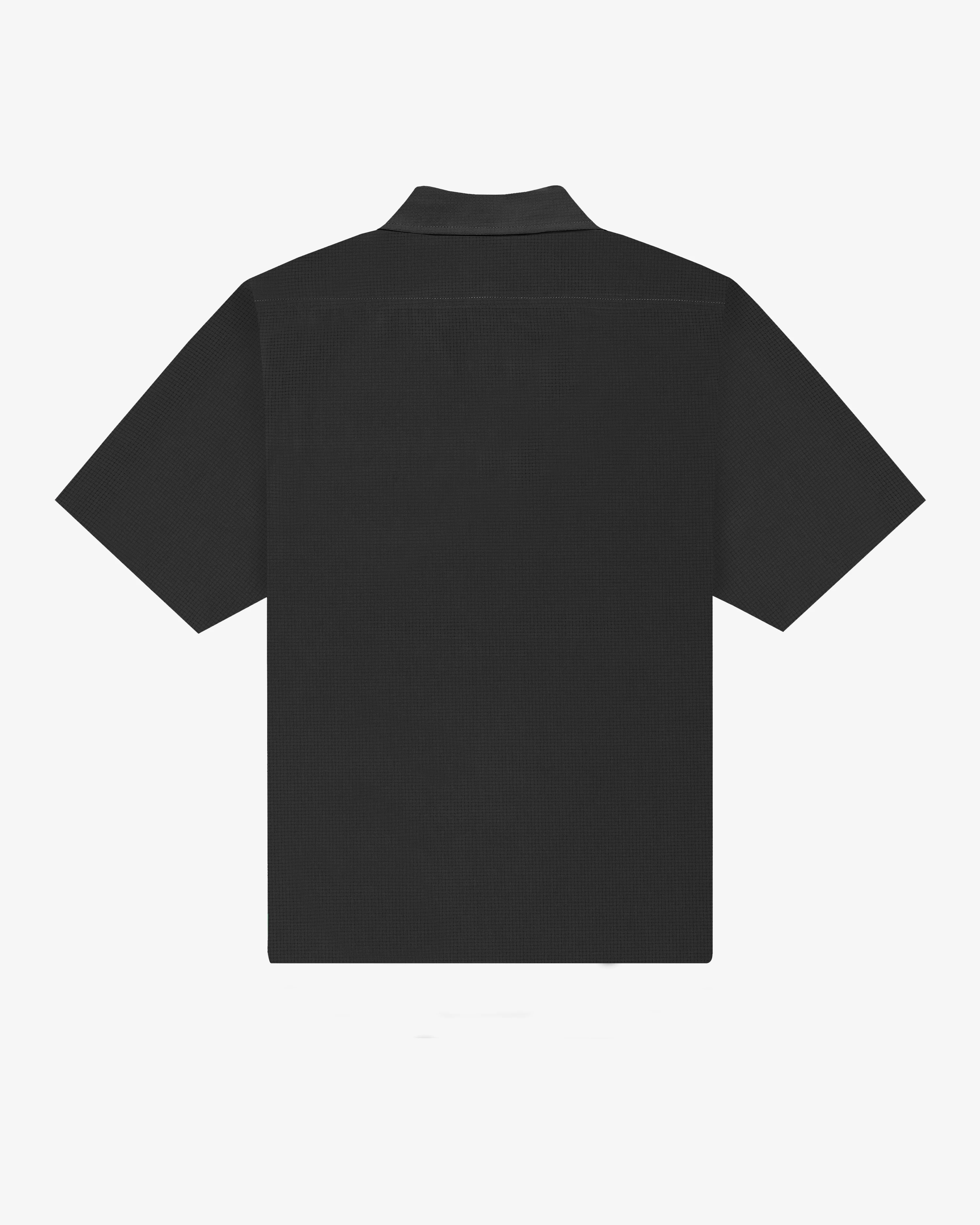 Back view of black textured short sleeve shirt with boxy silhouette