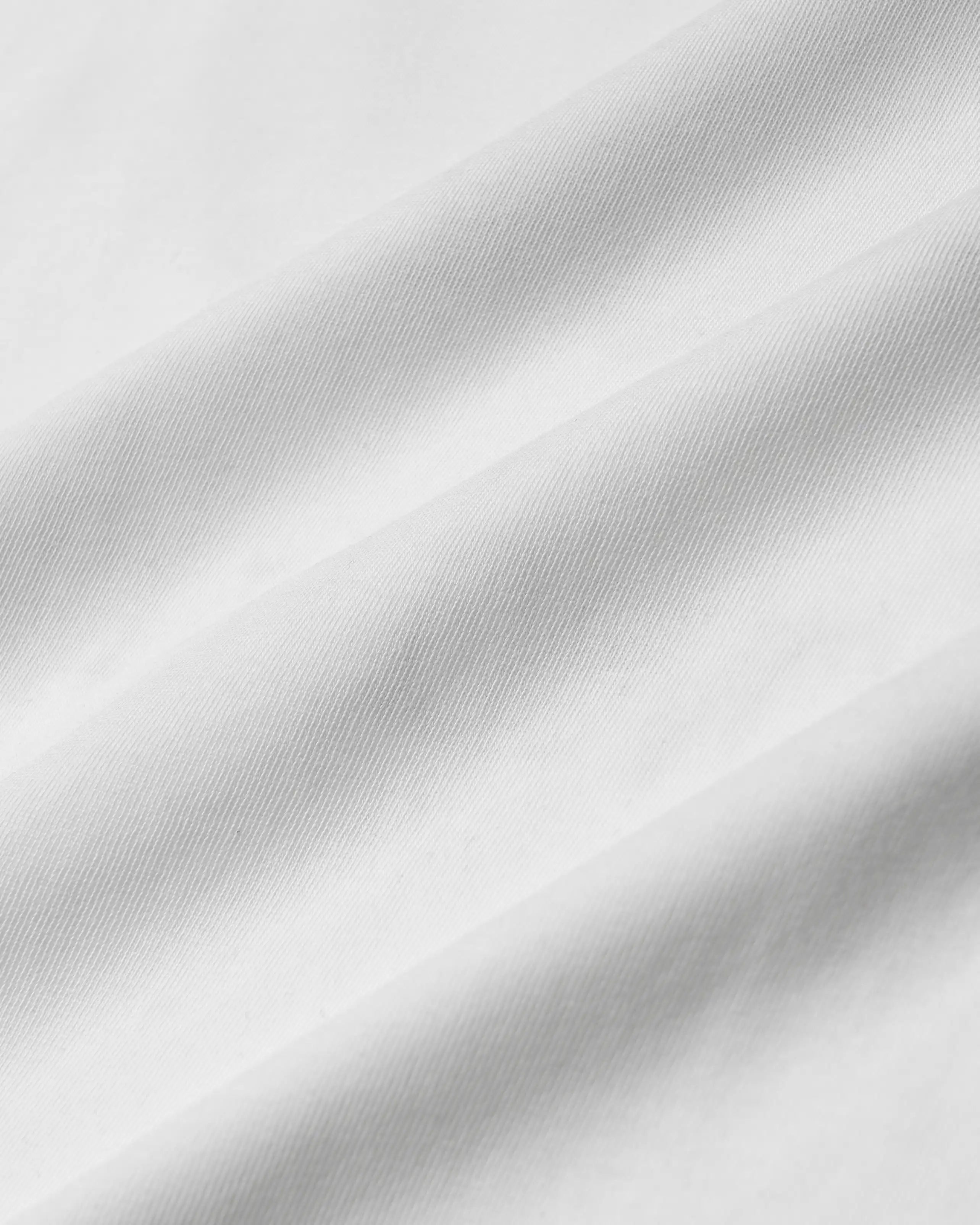 100% Cotton (220gsm)
Heavyweight cotton fabric with soft hand-feel
Boxy, relaxed fit with dropped shoulders
Ribbed crewneck collar
Dragged effect ikon logo on front and back
Artwork celebrates friendship and unity
"EMENTA© Moved By Friendship" motto on front and back
Double-stitched hems for durability
Made in Portugal