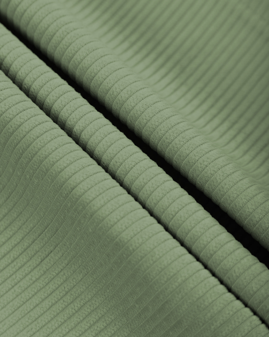 The Big Ikon Corduroy Relaxed Fit Pants in green offer a blend of comfort and style. Made from 100% cotton, these pants provide a soft and breathable feel. The relaxed fit ensures all-day comfort, while the Big Ikon embroidered logo on the back pocket adds a unique touch. With two front and two back pockets, they offer practicality for everyday wear.