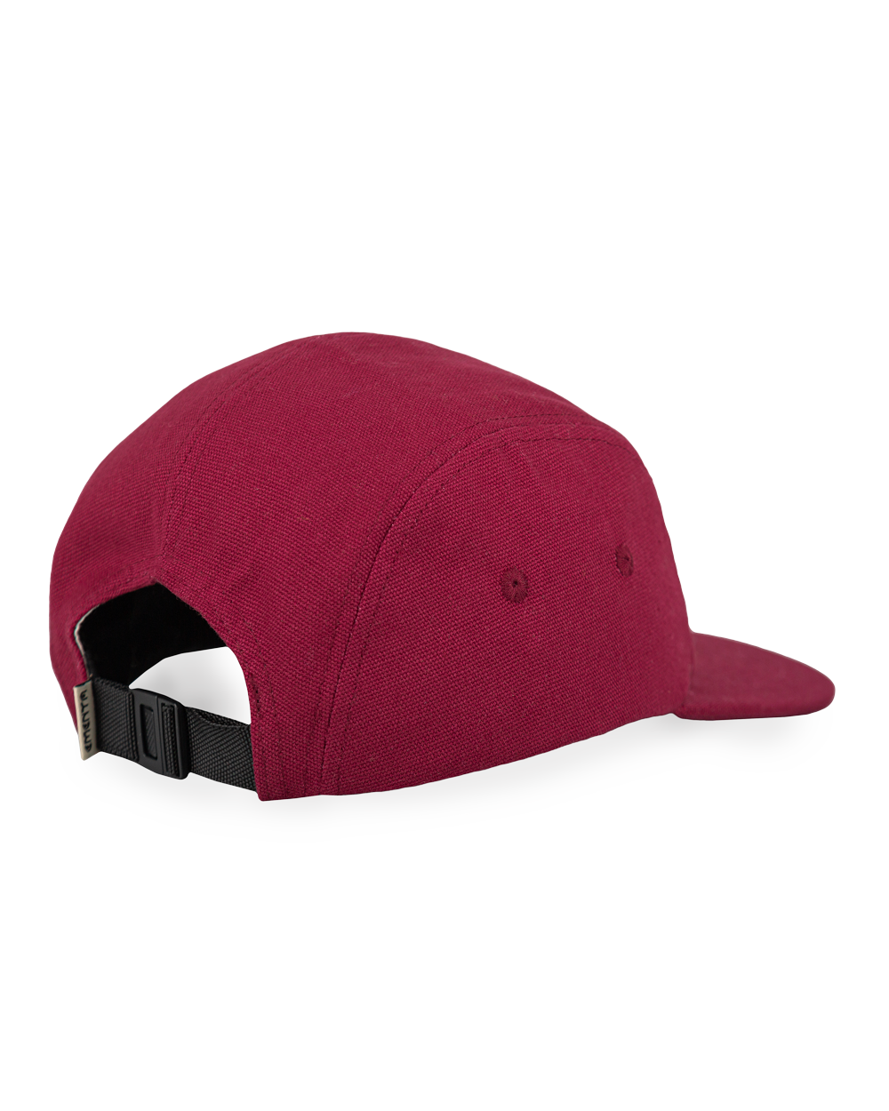 The Dots Canvas Cap is a classic five-panel cap crafted from durable 100% cotton canvas, offering a sturdy, comfortable fit. It comes in a burgndy color, complemented by a slightly curved brim. The front features the Ementa Dots logo, adding a clean touch to the design.