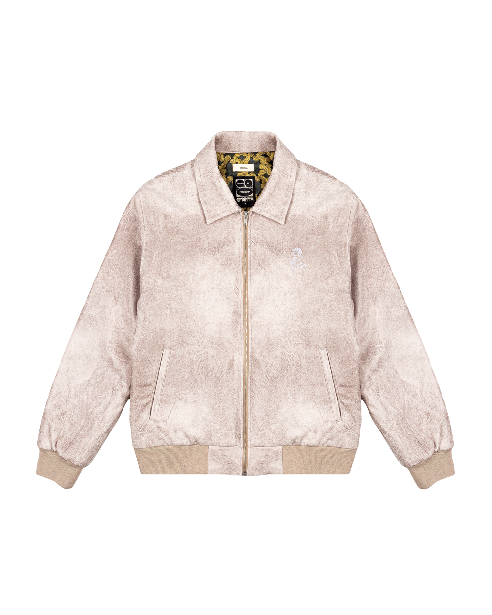 Suede taupe puffed jacket with a soft feel, designed with diamond stitching on the inside for added comfort and structure. This jacket offers practical features such as two front pockets, one interior pocket, and is made with a blend of materials for warmth.