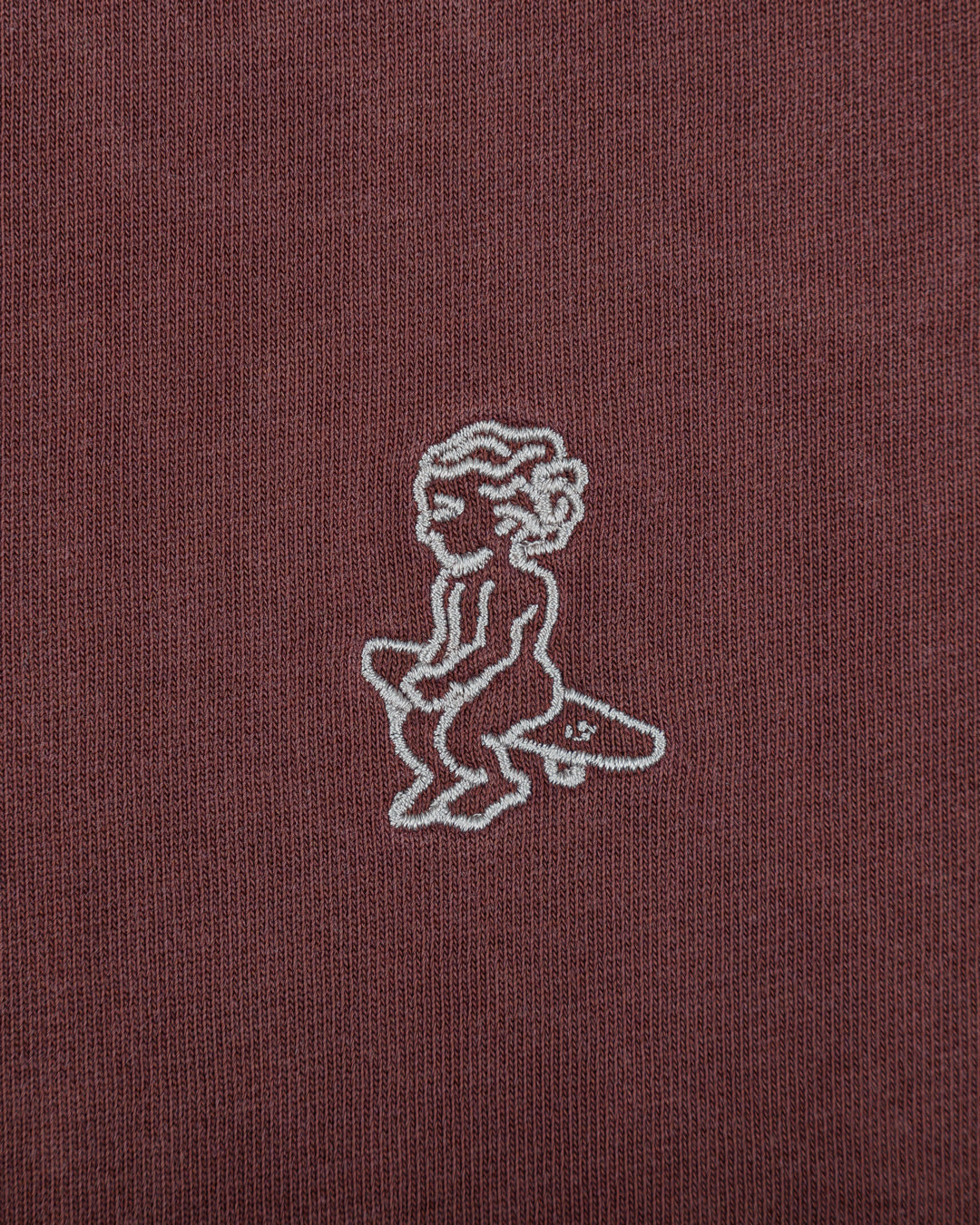 The Ikon Washed T-Shirt has a burgundy-washed finish and features the Ikon stamp embroidery on both the front and back, crafted from 100% cotton for lasting comfort and durability.