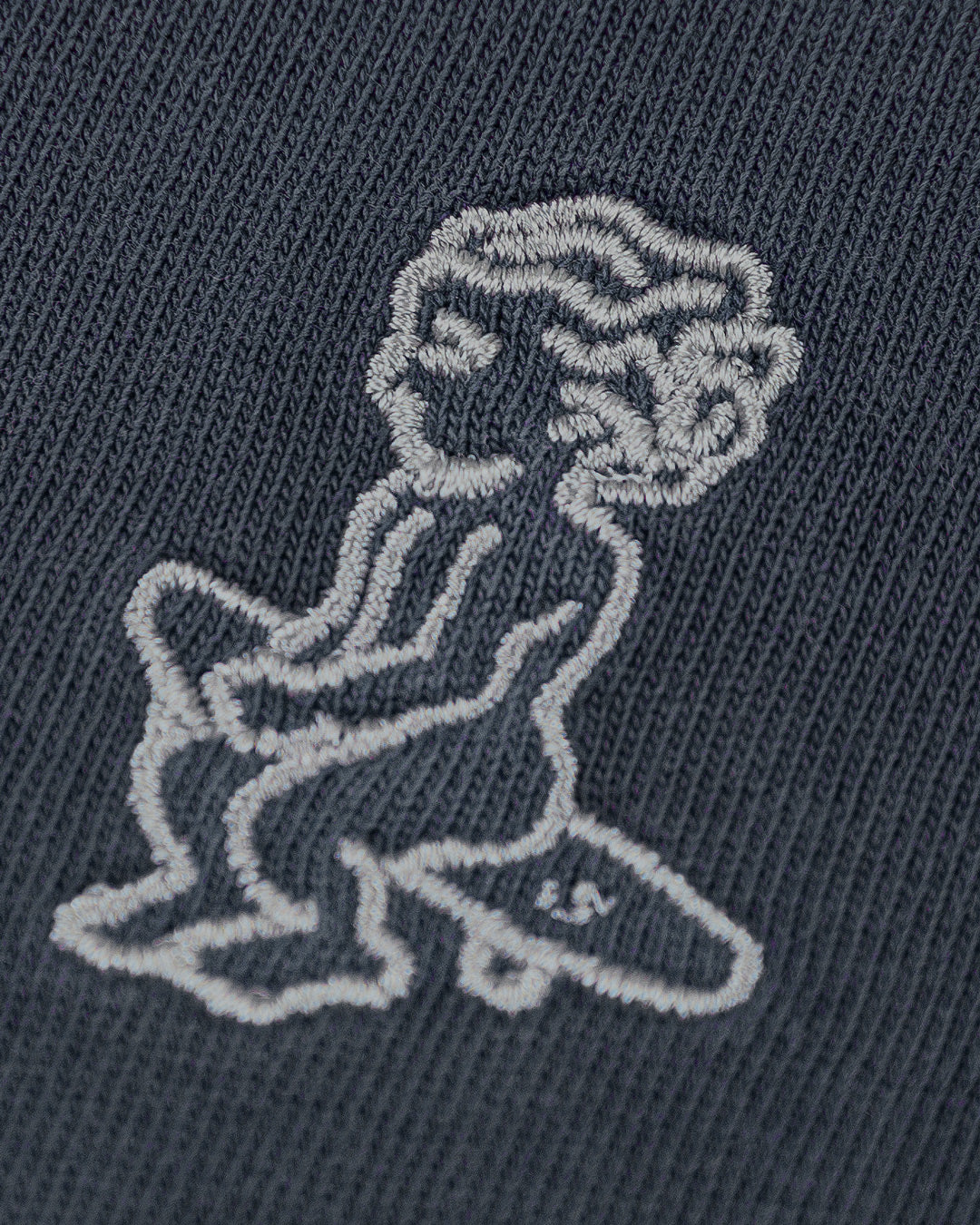 The Ikon Washed T-Shirt has a denim-washed finish and features the Ikon stamp embroidery on both the front and back, crafted from 100% cotton for lasting comfort and durability.