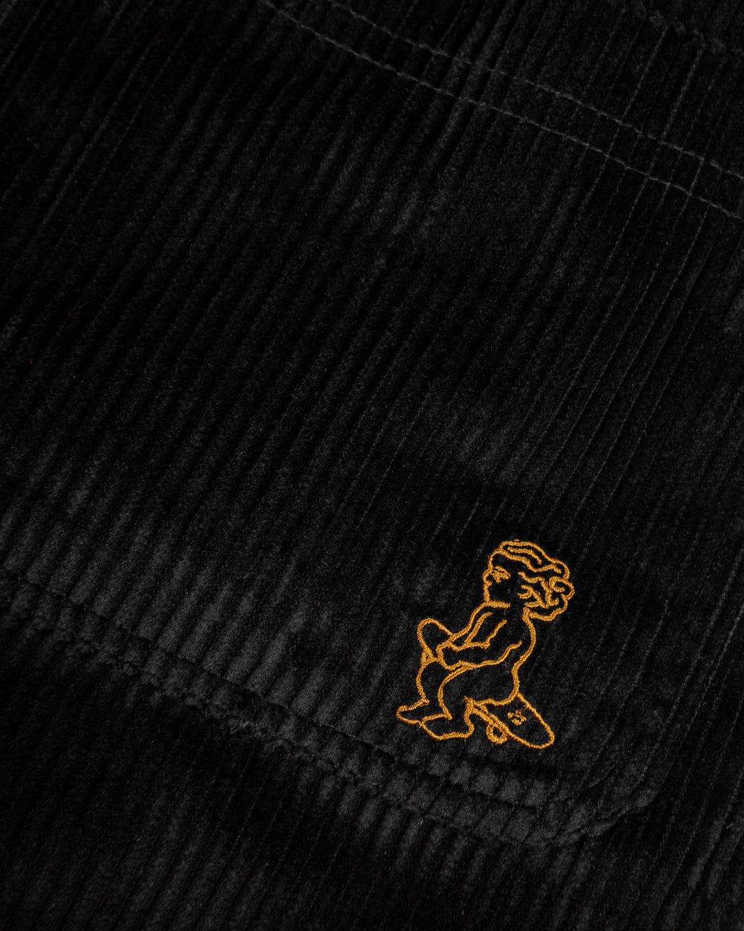 These corduroy black walk shorts offer a comfortable loose fit, making them perfect for all-day wear. Designed with an elasticated waistband for added comfort and flexibility, these shorts ensure a relaxed style. A liquid-resistant coating adds practical durability.

The shorts feature an embroidered signature logo in gold on the front, while the Ikon logo is subtly embroidered on the back.