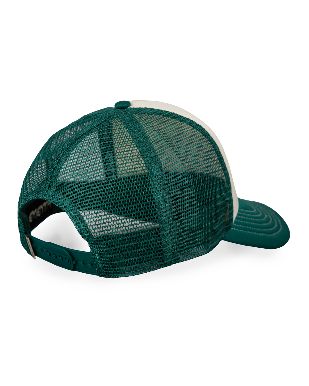 The Mbf Trucker Cap is a lightweight and breathable cap designed for everyday wear. It features a curved green brim with visible white stitching, adding a subtle contrast to the off-white front panel. A patch with our motto, ‘Moved By Friendship’, sits on the front, reflecting the spirit of connection and community. The cap’s breathable green mesh panels provide ventilation, while the adjustable back strap ensures a comfortable fit.