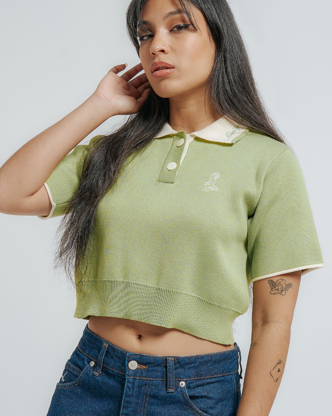 100% cotton knit
Lime knit fabric with off white contrasting details&nbsp;
Women's cropped fit
Classic polo collar in off white color&nbsp;
Two-button placket with matching cream buttons
Short sleeves with off white cuff trim&nbsp;
Ribbed hem for a clean finish&nbsp;
"Moved By Friendship" embroidery on the collar&nbsp;
Ikon logo embroidery on the left chest
Constructed from a soft knit fabric for a comfortable feel

Designed with a fitted silhouette that flatters the figure without being too tight
Breathabl