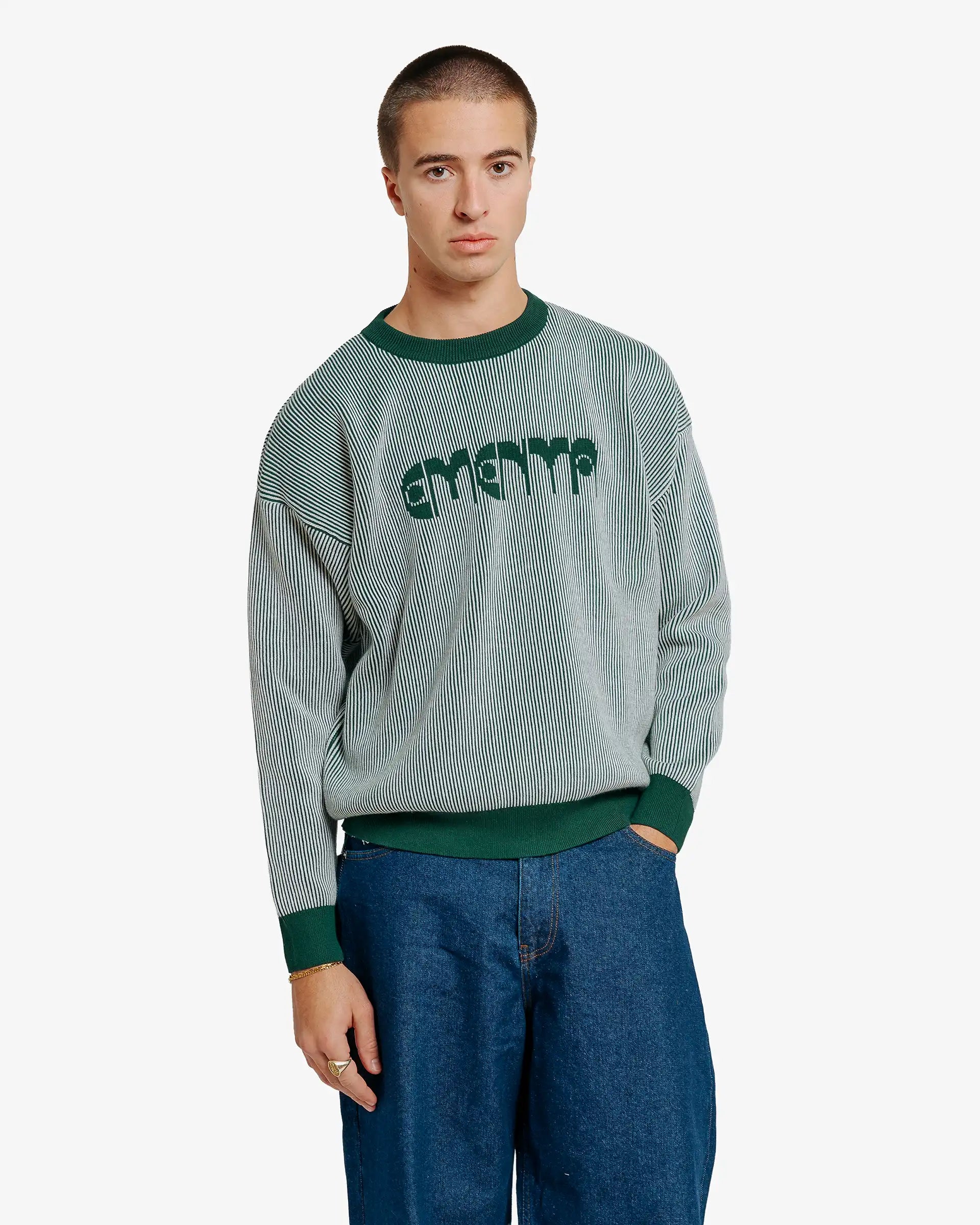 Reversible double-knit crewneck with inverted graphics on each side
Straight fit with relaxed volume through the body
Double-knit yarn fabric with a fine vertical stripe structure
Graphic print on the back with “Lisa” design referencing Lisbon's swallows

Made in Portugal from breathable cotton yarn
Hand wash cold and lay flat to dry