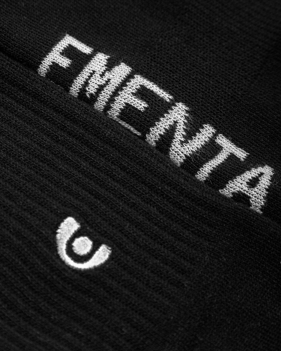 Ementa E-code socks, crafted from high-quality fabrics for a comfortable fit with every wear. Plain socks with ribbed stitching at the ankles, and an embroidered E-code logo. They are both comfortable and warm.